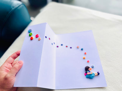 Girl Blowing Bubbles (Clay Card)